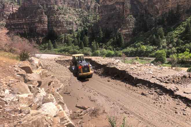 PICT 64J1 Loader works to clear a portion of Interstate 70 through Glenwood Canyon - CDOT