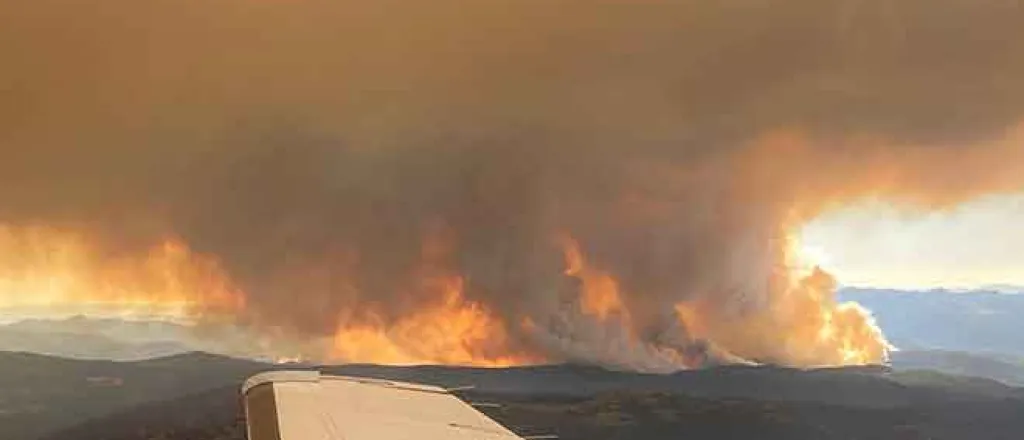 PICT Smoke and flames from the Cameron Peak Fire as seen from the air