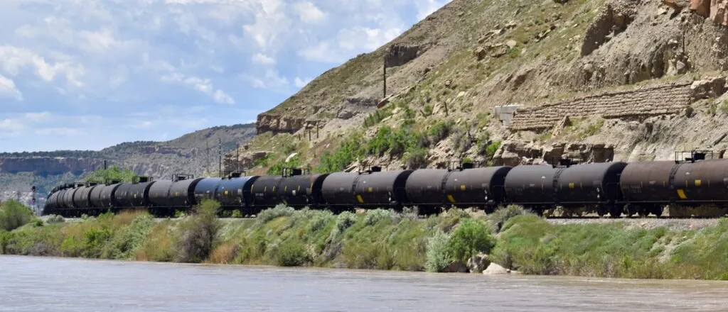 PICT A train of tanker cars travels the tracks along the Colorado River near Cameo on May 16, 2023. Chase Woodruff/Colorado Newsline PICT A train of tanker cars travels the tracks along the Colorado River near Cameo on May 16, 2023. Chase Woodruff/Colorado Newsline
