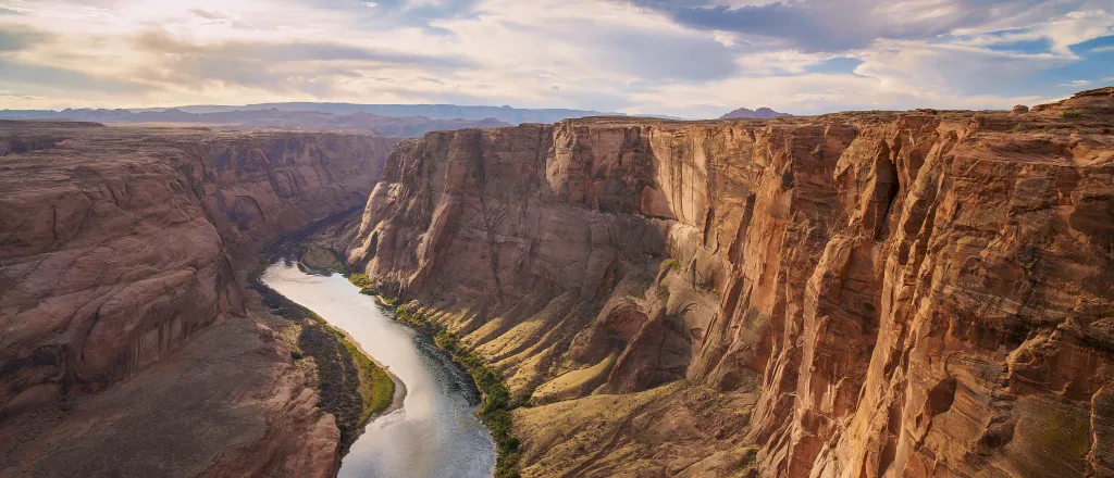 PROMO HIRES Outdoors - Grand Canyon Colorado River - ipanacea - iStock-1447630335 Arial view of the Colorado River running through the Grand Canyon.