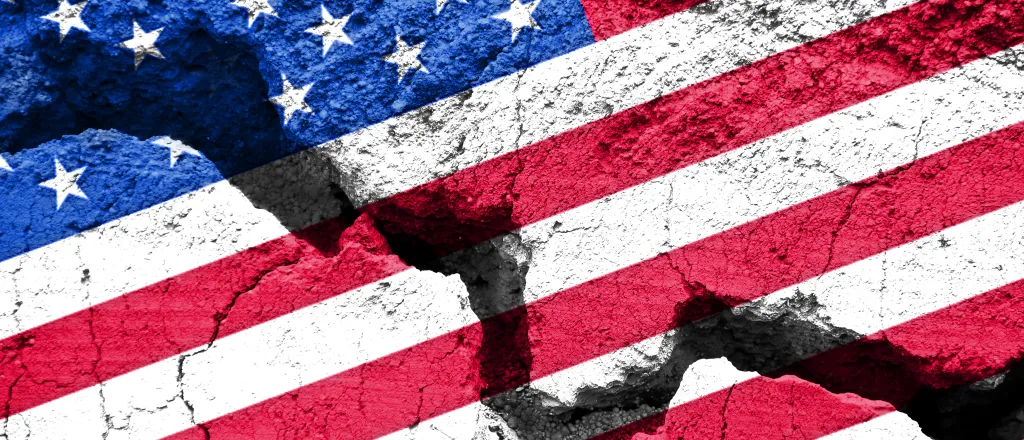 PROMO HIRES Politics - Election Flag United States Government - Delpixart - iStock-607610082 Flag of the United States of America with a crack running through it.