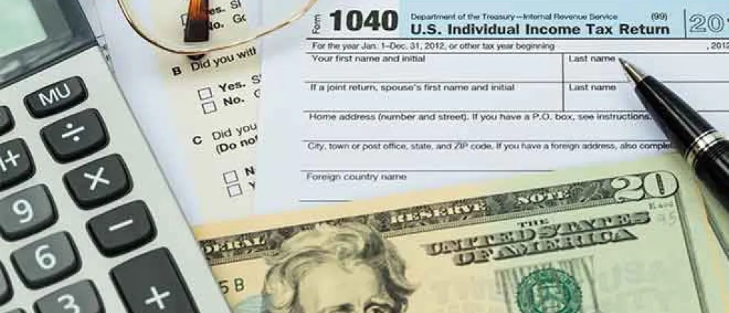 PROMO 64J1 Government - Tax Form Calculator Money - iStock PROMO Government - Tax Form Calculator Money - iStock