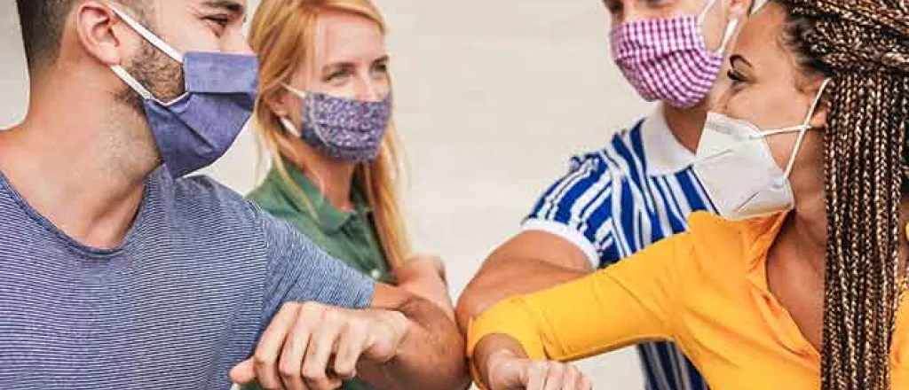 PROMO 64J1 Health - Mask People Elbow Bump - iStock - DisobeyArt PROMO 64J1 Health - Mask People Elbow Bump - iStock - DisobeyArt