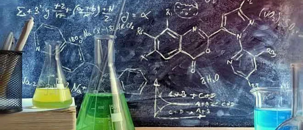 64J Science - Beaker Chemical Formula Books Education - iStock - Davizro Science - Beaker Chemical Formula Books Education - iStock - Davizro