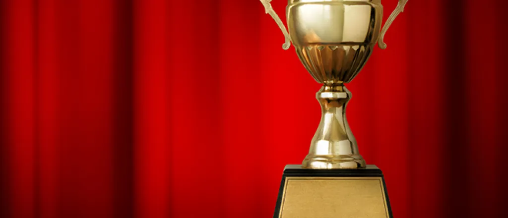 PROMO 660 x 440 Sports - Trohphy Red Curtain - iStock PROMO 660 x 440 Sports - Trohphy Red Curtain - iStock