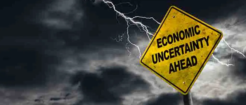 PROMO 64J1 Economy - Sign Economic Uncertainty Ahead Inflation - iStock - ronniechua PROMO Economy - Sign Economic Uncertainty Ahead Inflation - iStock - ronniechua