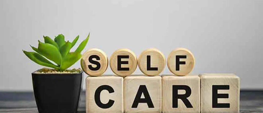 PROMO Health - Self Care Words Blocks Mental Behavioral - iStock - Aksana Kavaleuskaya