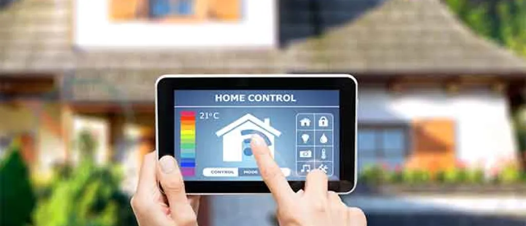 PROMO 64J1 Miscellaneous - Home Control Automation Tablet Hand House - iStock - scyther5