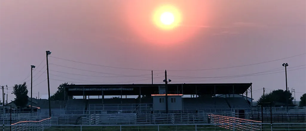 PROMO 660 x 440 Miscellaneous - Kiowa County Fairgrounds Grandstand Smoky Sunset - Chris Sorensen