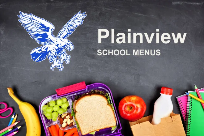 The Plainview School Hawks mascot, chalked on a blackboard above a packed school lunch of a sandwich, grapes, carrots, an apple and a bottle of milk, with pencils and notebooks. The board reads “Plainview School Menus”.
