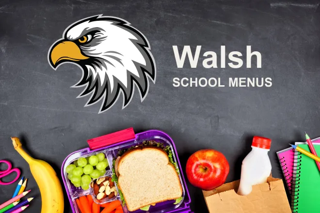The Walsh School Eagles mascot, chalked on a blackboard above a packed school lunch of a sandwich, grapes, carrots, an apple and a bottle of milk, with pencils and notebooks. The board reads “Walsh School Menus”.