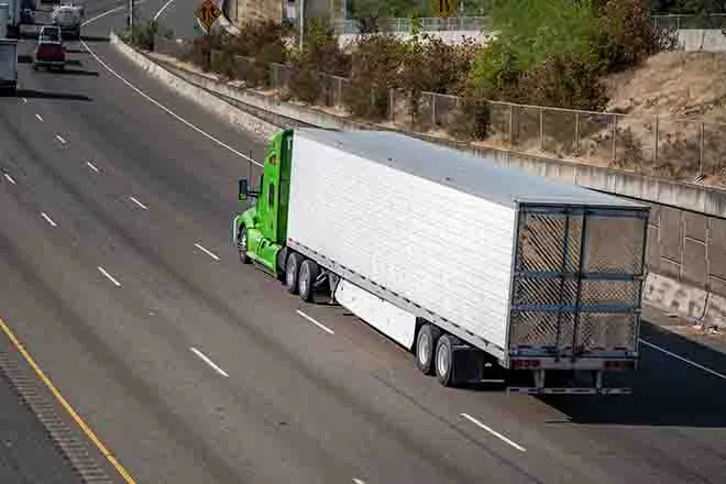 PROMO 64J1 Transportation - Semi Truck Trailer Highway Road - iStock - vitpho PROMO 64J1 Transportation - Semi Truck Trailer Highway Road - iStock - vitpho
