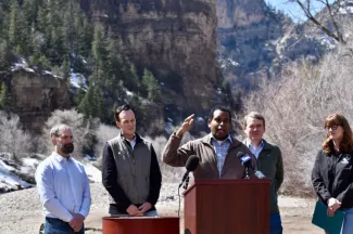 PICT From left, Glenwood Springs Mayor Jonathan Godes, state Sen. Dylan Roberts, U.S. Rep. Joe Neguse, U.S. Sen. Michael Bennet and Colorado House Speaker Julie McCluskie. Chase Woodruff/Colorado Newsline