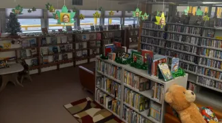 Kiowa County Public Library Interior of the Kiowa County Public Library showing shelves of books and decorations.