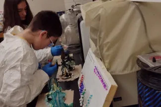 Two Plainview School students conduct a science experiment.