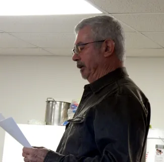 Van Brown, Director of Public Work for the Town of Eads, reading an apology at a town board meeting. Van Brown, Director of Public Work for the Town of Eads, reading an apology at a town board meeting.
