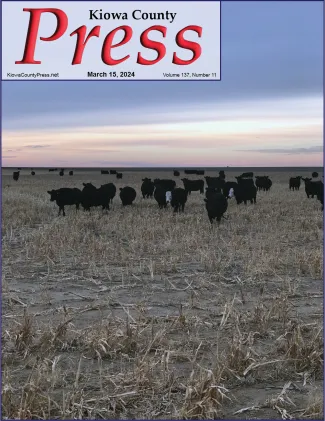 Front page of the March 15, 2024, edition of the Kiowa County Press showing cattle standing in a stubble field under cloudy skies.