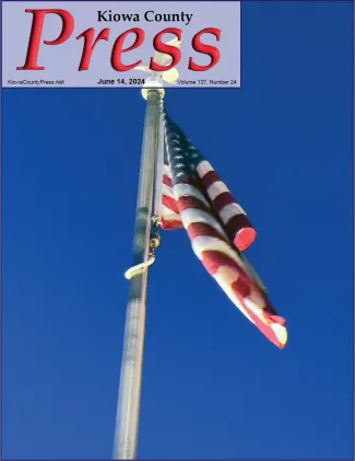 In honor of Flag Day, a view of the flag of the United States - Chris Sorensen View looking up at a United States flag on a pole against a blue sky.