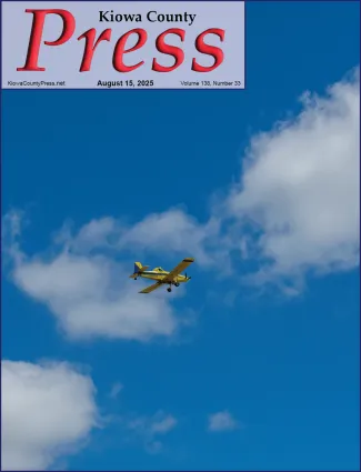 Photo of the week from the August 15, 2025, edition of the Kiowa County Press in Eads, Colorado -  Agricultural plane flying over Kiowa County, Colorado - Chris Sorensen.