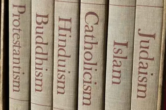 PROMO Faith - Books Protestant Buddhist Hindu Catholic Islam Judaism - iStock - MarkSkalny