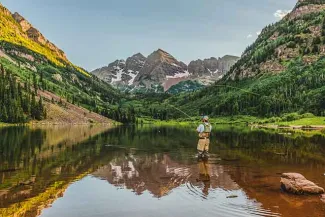 PROMO Outdoors - Fishing Fisherman Aspen Maroon Bells Mountains Water Trees - iStock - Matt Dirksen