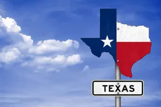 PROMO State - Texas Road Sign - iStock - gguy44