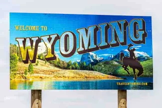 PROMO 64J1 States - Wyoming Welcome to Wyoming Sign - iStock - krblokhin PROMO 64J1 States - Wyoming Welcome to Wyoming Sign - iStock - krblokhin
