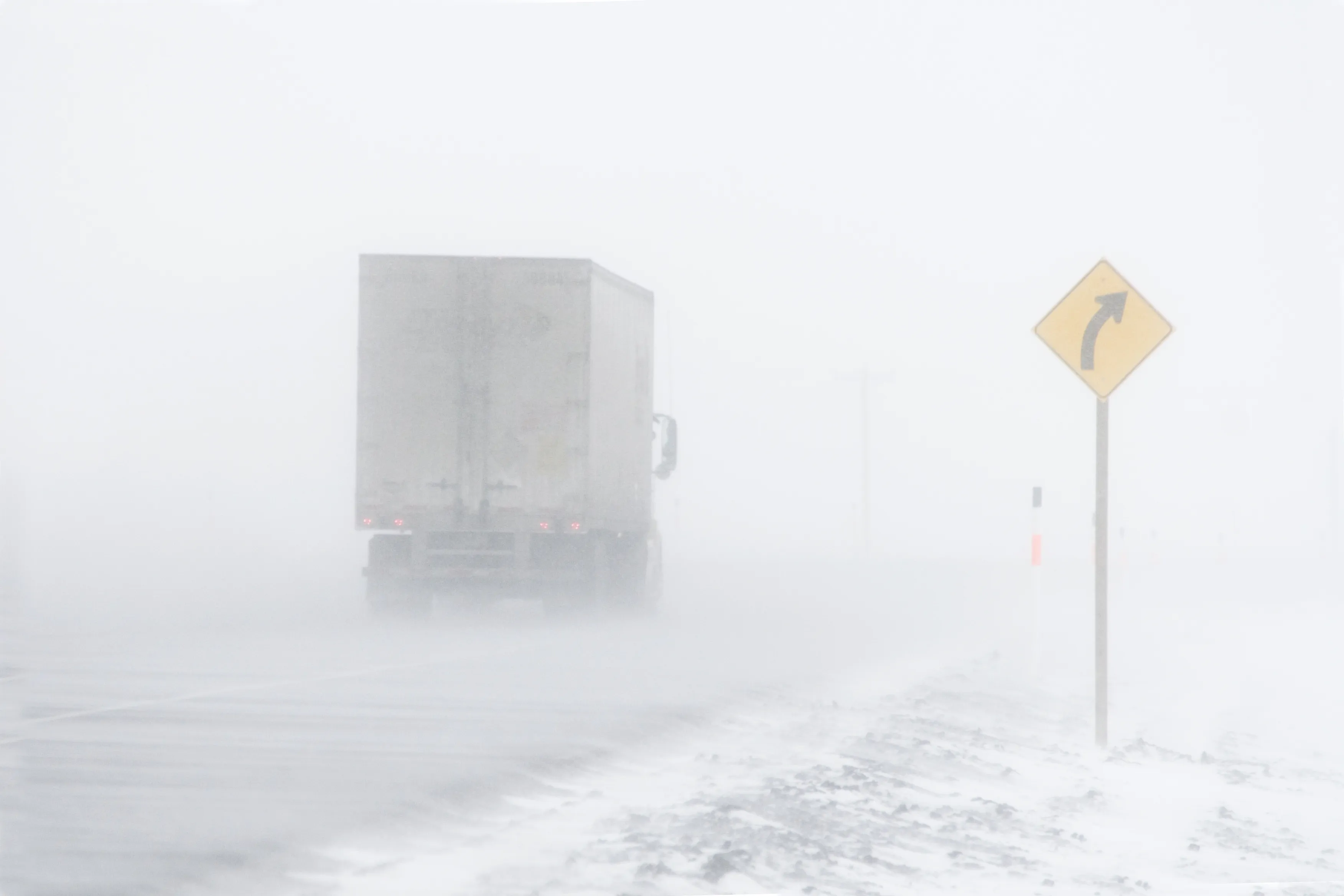 Semi truck on a snow-covered road