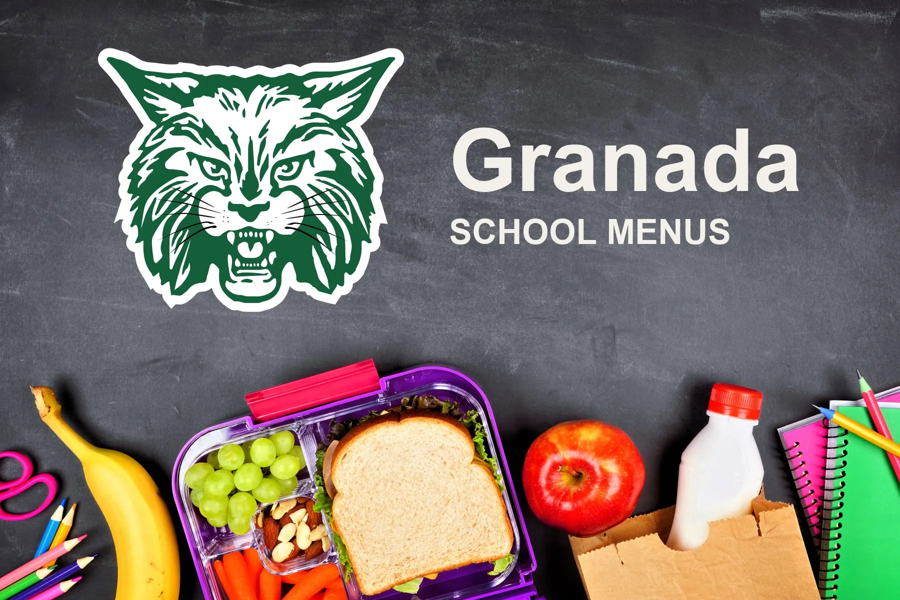 The Granada School Bobcats mascot, chalked on a blackboard above a packed school lunch of a sandwich, grapes, carrots, an apple and a bottle of milk, with pencils and notebooks. The board reads “Granada School Menus”.