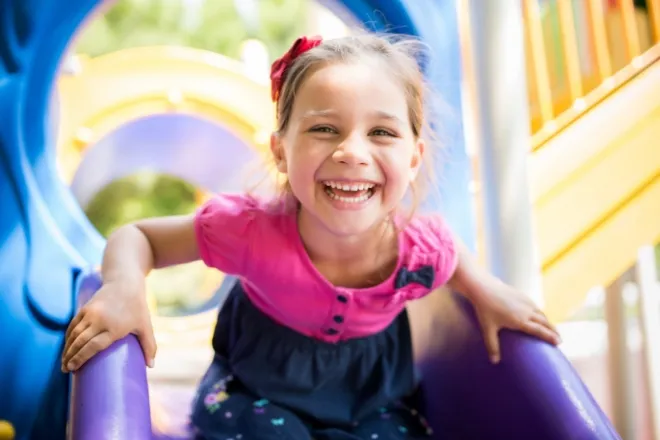 girl playing at best playgrounds in colorado