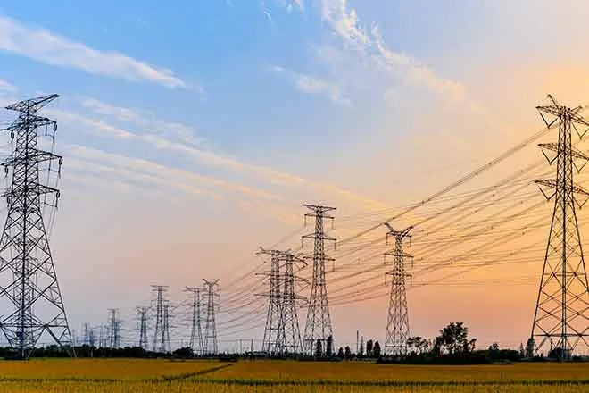 PROMO Energy - Power Lines Sky Clouds High Voltages - iStock - zhaojiankang