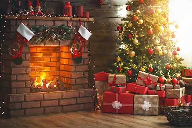 PROMO 64J1 Holiday - Fireplace Stockings Tree Gifts Presents - iStock - evgenyatamanenko