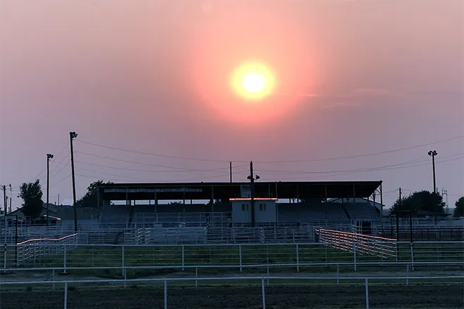 PROMO 660 x 440 Miscellaneous - Kiowa County Fairgrounds Grandstand Smoky Sunset - Chris Sorensen