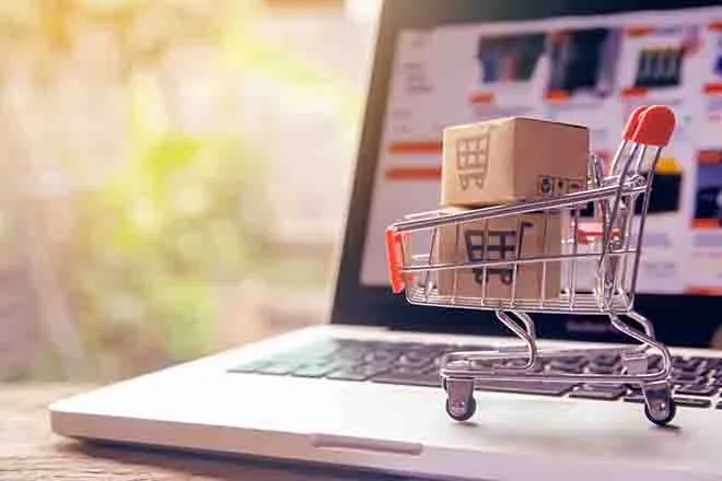 PROMO Business - Shopping Cart Packages Boxes Computer Home - iStock - Tevarak