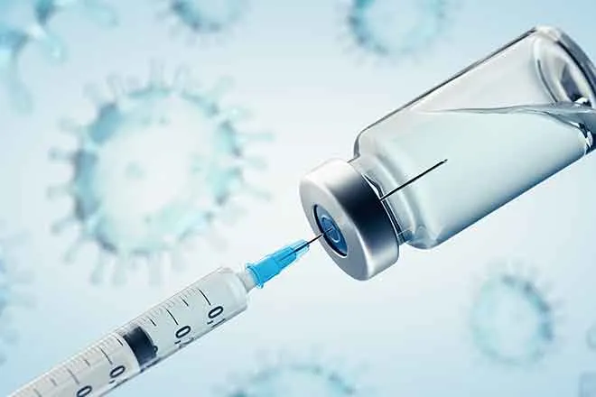PROMO Health - Vaccine Immunization Virus Needle Vial COVID-19 Coronavirus - iStock - ffikretow