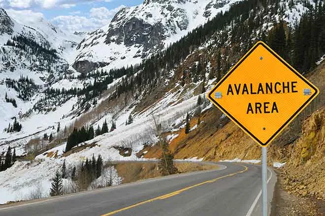 PROMO Miscellaneous - Avalanche Area sign snow mountain road danger emergency weather - iStock - wakr10