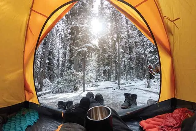PROMO Outdoors - Camping Tent Gear Forest Trees Snow - iStock - Mumemories