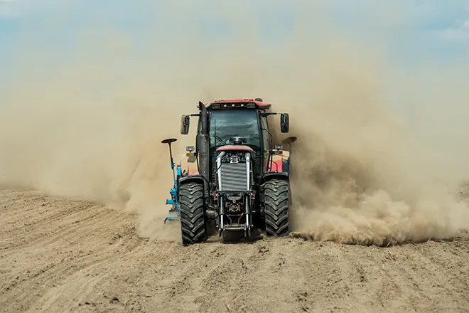 PROMO 660 x 440 Agriculture - Tractor Plow Dust Field Drought - iStock - Dmytro Shestakov