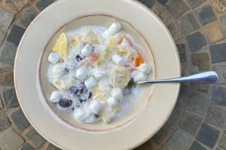 Ambrosia - USDA Bowl of Ambrosia dessert with spoon