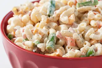 Quick N Cool Summer Salad - USDA Bowl of macaroni and vegetable salad.