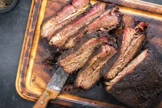 Slow Cook Barbecue - USDA Tray with sliced barbecue beef.