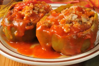 Stuffed Green Peppers - USDA Plate with two halves of stuffed green peppers.