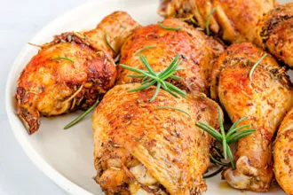 Honey Lemon Chicken - USDA Platter of honey lemon chicken pieces.