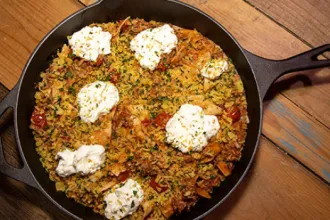 Quick Skillet Lasagna - USDA Pan of quick skillet lasagna with dollops of cottage cheese on top.